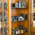 Antique Black Binoculars inside a Display Case with Showcase