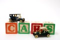 Antique Black Cars on ABC Blocks Royalty Free Stock Photo