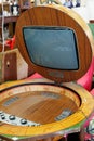 Antique Black and White TV set with Cathode Ray Tube Set in a Wooden Cabinet with a Folding Screen