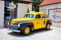 Antique black and yellow cab at WDW