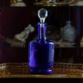 Antique blue glass vase in luxury interior. Royalty Free Stock Photo