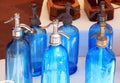 Antique blue soda syphon bottles on flea market