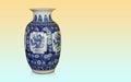 antique blue and white ceramic vase on gradient yellow and blue background, object, vintage, decor, ancient, gift, copy space Royalty Free Stock Photo