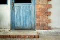 Antique blue wood doors and window with red brick wall Royalty Free Stock Photo