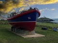 Antique boat set on the Atlantic shore