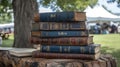 Antique Book Stack on Wooden Table at Outdoor Market Royalty Free Stock Photo