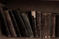 Antique books on bookshelf. Old leather bound vintage books Royalty Free Stock Photo