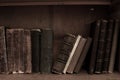Antique books on bookshelf. Old leather bound vintage books Royalty Free Stock Photo