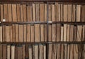 Antique books chained to the bookshelves