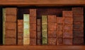 Antique books on old wooden shelf. Royalty Free Stock Photo