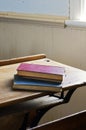 Antique Books Stacked on School Desk Dramatic Light Royalty Free Stock Photo