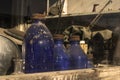 Antique Bottles in Abandoned Store Window Royalty Free Stock Photo