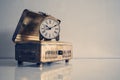 Antique brass box with old pendulum table clock Royalty Free Stock Photo