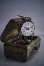 Antique brass box with old pendulum table clock Royalty Free Stock Photo