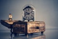 Antique brass box with old pendulum table clock Royalty Free Stock Photo