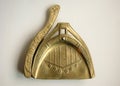 Brass brush and dustpan with art nouveau decoration.