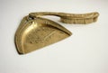 Brass brush and dustpan with art nouveau decoration.