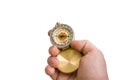 Antique brass compass in a hand isolated on white Royalty Free Stock Photo