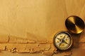 Antique brass compass over old background Royalty Free Stock Photo