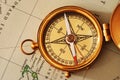 Antique brass compass over old Canadian map Royalty Free Stock Photo