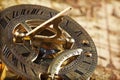 Antique brass compass and sundial Royalty Free Stock Photo