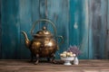 antique brass kettle on rustic wooden table Royalty Free Stock Photo