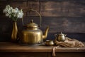 antique brass kettle on rustic wooden table Royalty Free Stock Photo