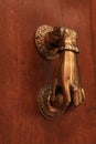 Antique brass knocker