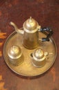 Antique brass teapot set. Royalty Free Stock Photo