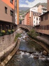 Antique bridge over the Valira river in Andorra.