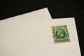 Antique British Postal Service stamp on blank white envelope