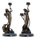 Antique bromze candelabrum with woman's figurine.