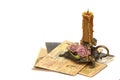 Antique bronze candlestick, candle and old photos Royalty Free Stock Photo