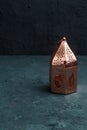 Antique bronze copper ramadan lantern on a navy blue concrete Royalty Free Stock Photo