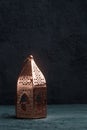 Antique bronze copper ramadan lantern on a navy blue concrete Royalty Free Stock Photo
