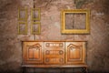 Antique cabinet wood and old picture frame Royalty Free Stock Photo
