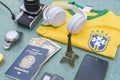 Antique camera, silver wristwatch, Brazilian soccer team t-shirt, headphones Royalty Free Stock Photo