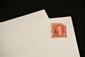 Antique Canadian Postal Service stamp on blank white envelope