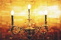 Antique candelabra with three melting candles