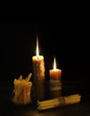 Antique candles in the darkness Royalty Free Stock Photo