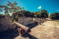 Antique cannons lined up defend a fortress in Santo Domingo Dominican Republic