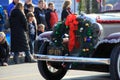 Antique car driving through the Annual Holiday Parade,Glens Falls New York,2014