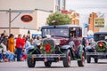 Antique car driving in Cowboy Christmas Parade