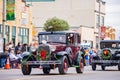 Antique car driving in Cowboy Christmas Parade