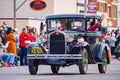 Antique car driving in Cowboy Christmas Parade