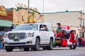 Antique car driving in Cowboy Christmas Parade