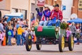 Antique car driving in Cowboy Christmas Parade