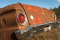 Antique car trunk in the farm field Royalty Free Stock Photo