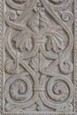 Antique carved stone bas-relief with a floral pattern Royalty Free Stock Photo