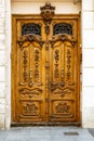 Antique carved wooden double door close up